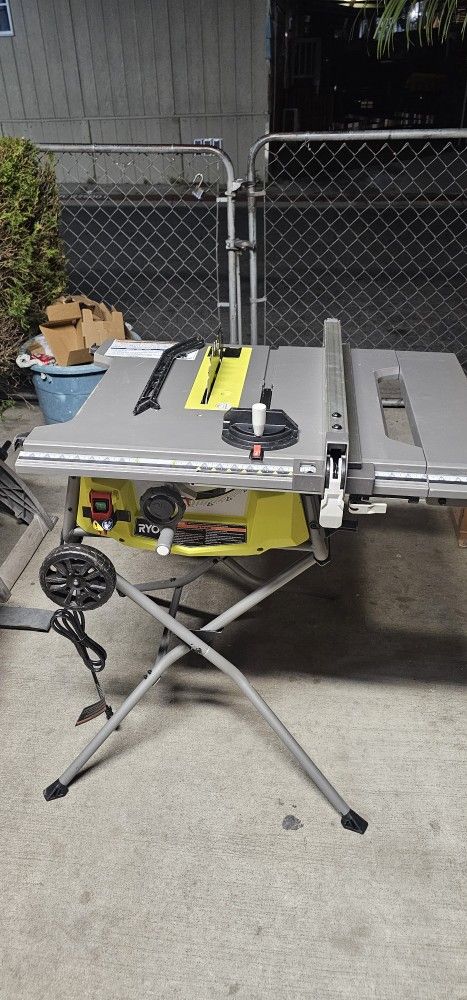 RYOBI 15AMP 10IN EXPANDED CAPACITY PORTABLE CORDED TABLE SAW WITH ROLLING STAND BRAND NEW 