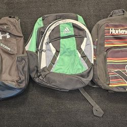 3 Backpacks- Under Armour (Sling), Adidas And Hurley