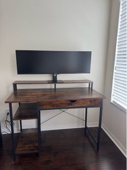 Desk with riser