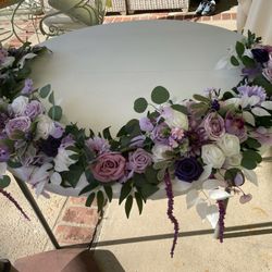 2 Artificial Flower Garland wreaths for table decor

Condition is used twice
$120 for longest wreath
$110 for shorter

Measurement of each arrangement