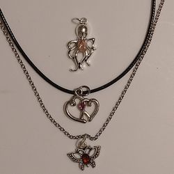 garnet butterfly, heart sapphire, pink tourmaline octopus necklaces