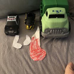 Garbage Truck, Police Car, Power Ranger Lion, And 3 Paper Stockings