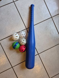 Plastic Blue Bat and wiffle balls