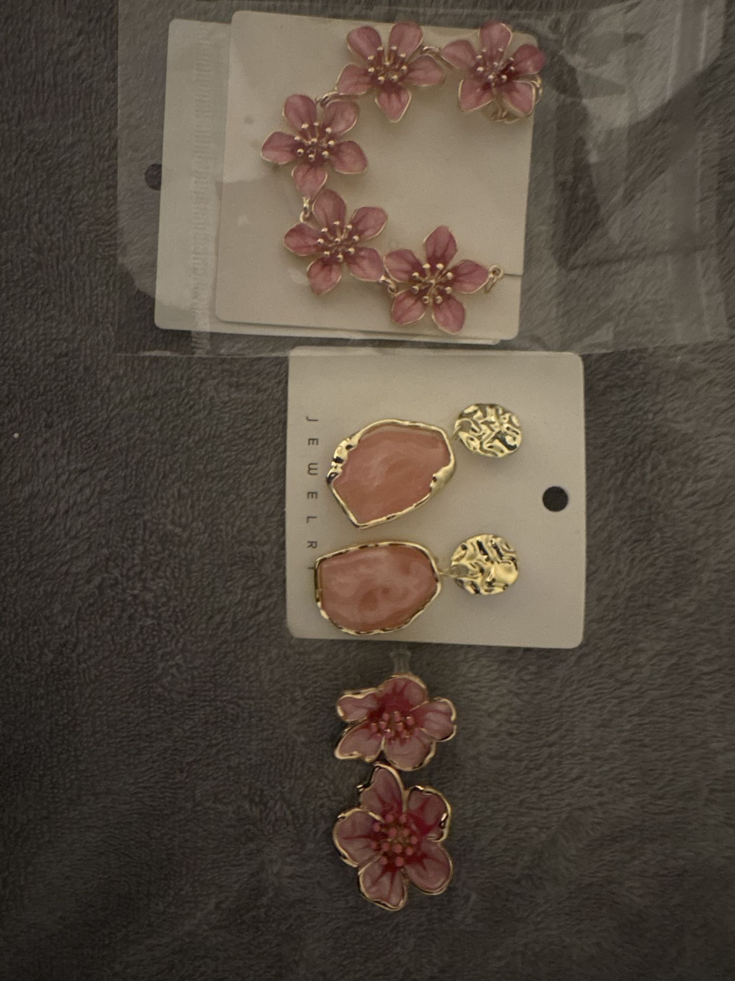 Brand new, unused. Modern high-fashion pink floral earrings