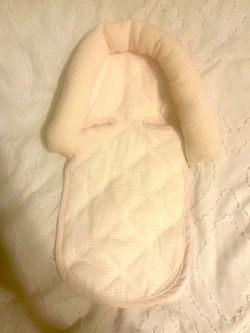 Pink stripped head support for car seat