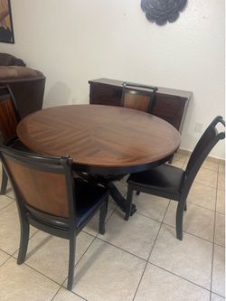 Table and 4 chairs/free delivery