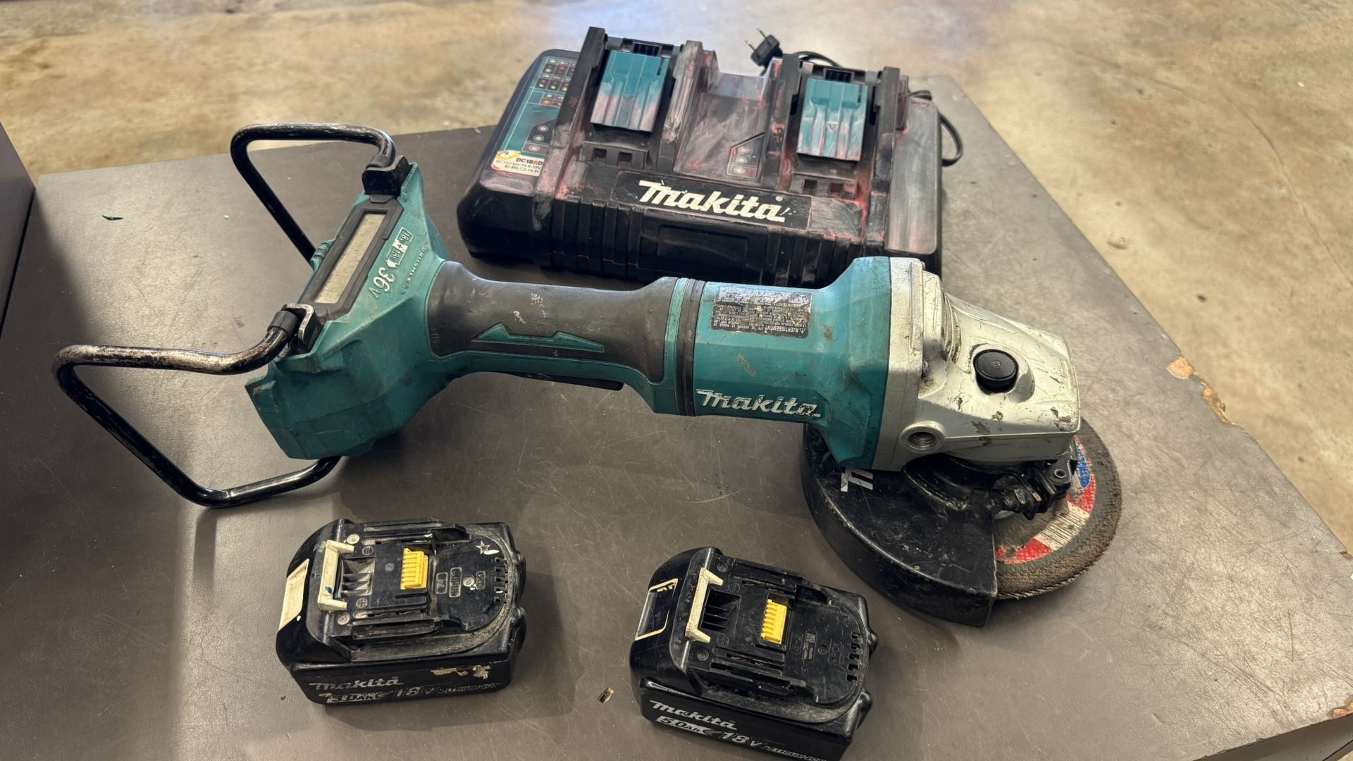 Makita 36v LXT Brushless 7” cut off angle grinder w 2 batt and chrg no trades pick in Tacoma FIRM PR