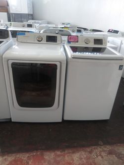 Samsung top load washer and dryer set working perfectly with 4 months warranty