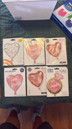 Assorted wedding related foil balloons