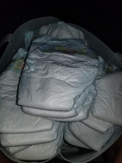 Pampers swaddlers, luvs and huggies size 1 and 2