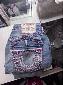 Denim true religion jeans with light and hot pink stitch around
