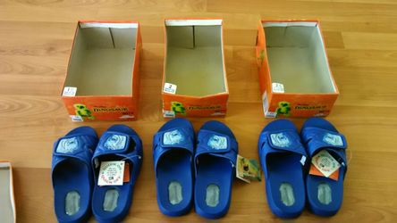 Brand new, in box, never worn, boys Walt Disney Dinosaur Sandals