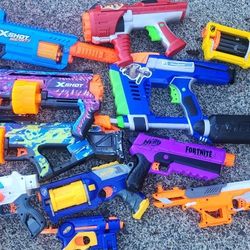 LOT- 11 NERF GUNS