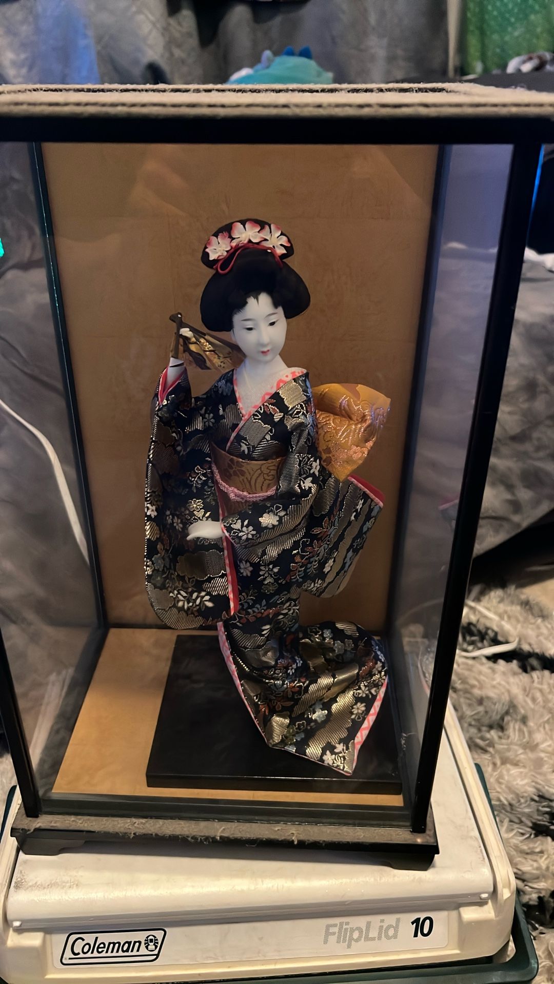 Vintage geisha doll is a traditional Japanese doll.