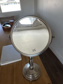10x magnifies mirror