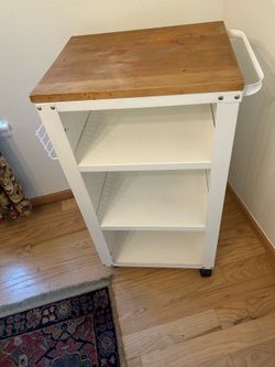 Rolling metal cart with wood top