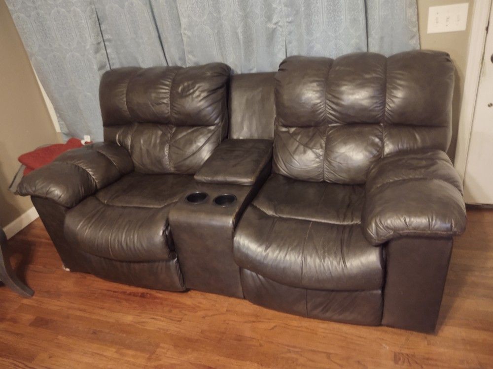 Leather couch good condition local free delivery giving second sofa for free serious buyer please