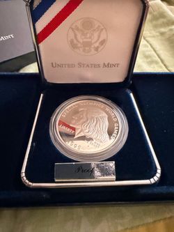1995 Special Olympics World Games Silver Proofdollar and 2011 United States Army Commemorative Coin program Proof