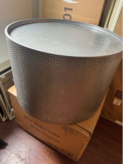 silver round metal top coffee table