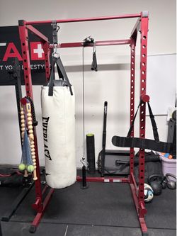 Red squat rack plus pulley system !