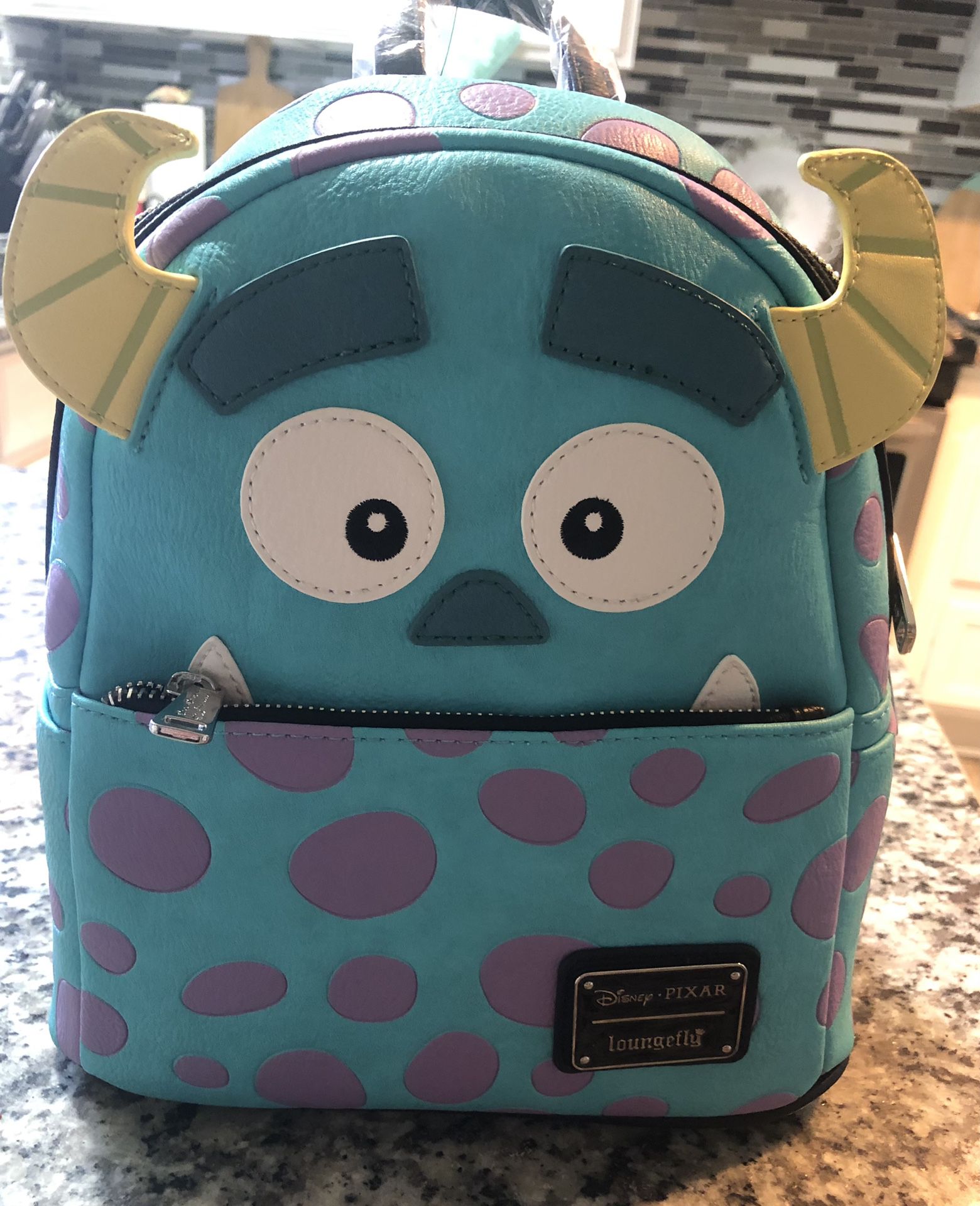 LOUNGEFLY Disney Parks Pixar Monsters Inc Sully Mini Backpack