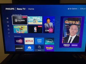 Phillips 32 inch Roku Tv with remote.