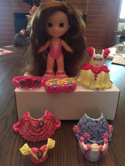 Doll with snap on clothes