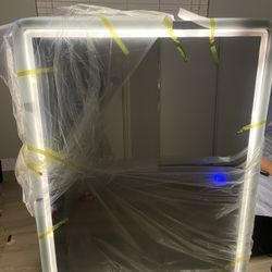 L.E.D Mirror Includes Wall Mounts & Hardware. This mirror also has a 3 light settings Brand new item $180 o.b.o