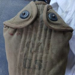 Original WWII US ARMY CANTEEN & CANVAS COVER sells for 50.00 on e bay