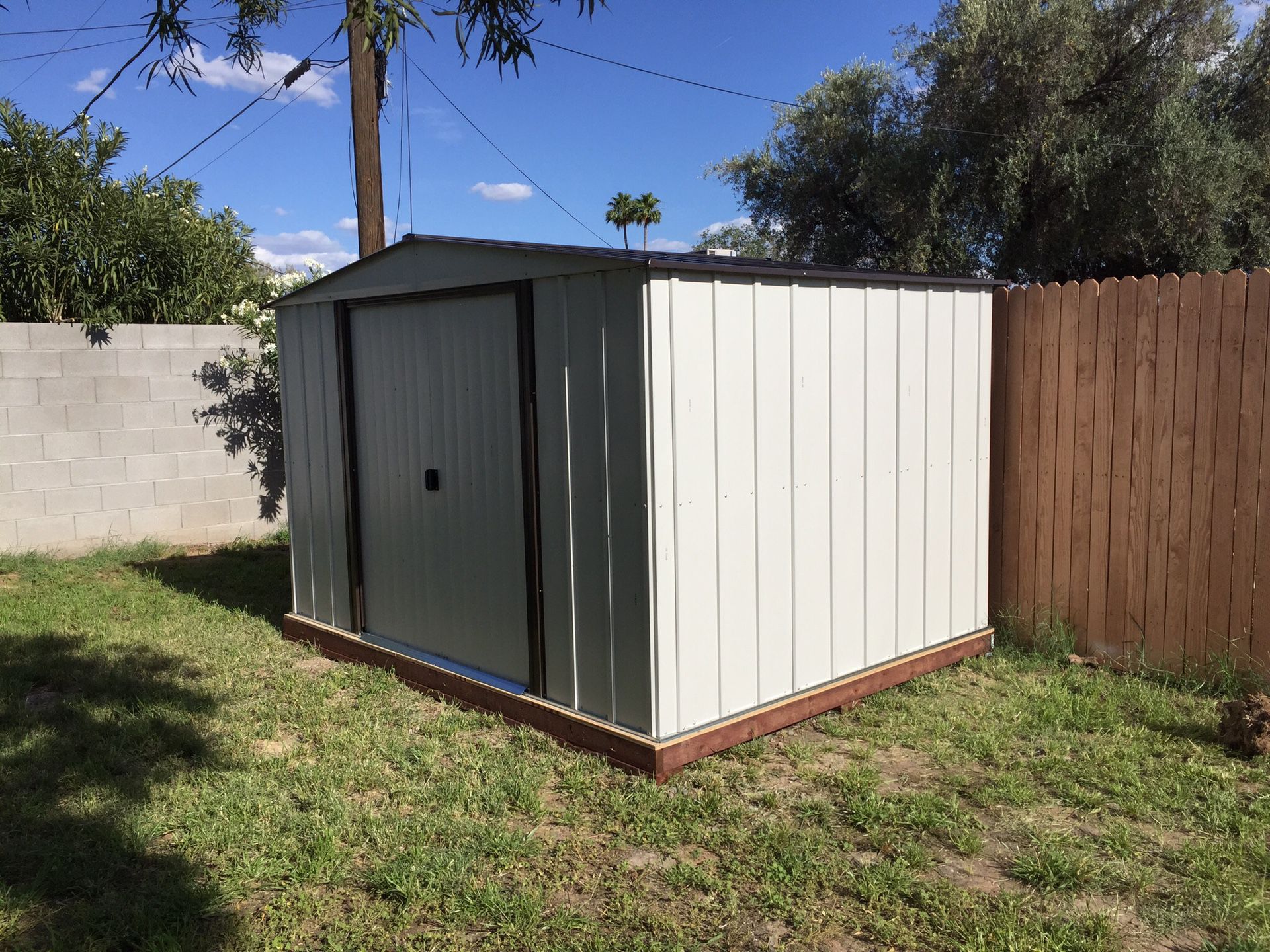 10x8 Steel Storage Shed Installed with treated lumber base