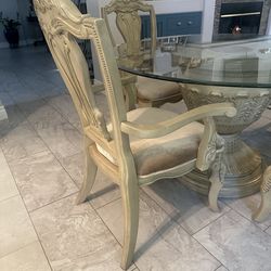 Beautiful round dining table with five chairs