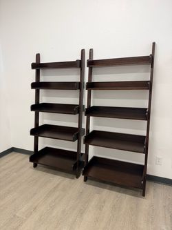 Brown wood book shelves