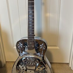 1983 Dobro Steel body guitar.