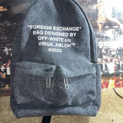 slogan-print zip-up backpack from OFF-WHITE 