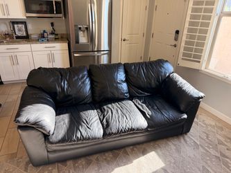 Free small black leather couch