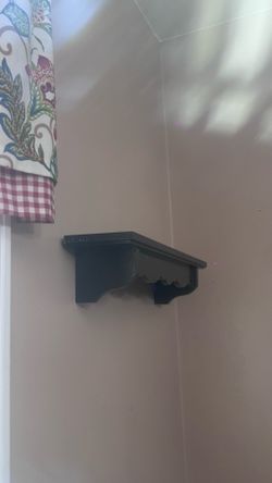 2 small brown shelves