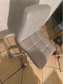 Grey pleather rolling chair