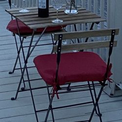 IKEA Table, 2 Chairs And 2 Red Cushions 