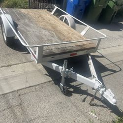 Utility Trailer Bought It New Never Used It Have the Pink And has Prelates 