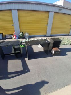 Three office desk and other desks