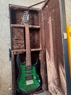 Ibanez Gio GRX70QA with hard shell case