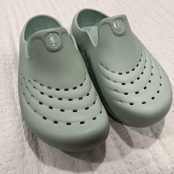 LV shark clogs
