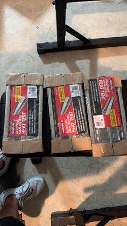 Adjustable bbq heat shield