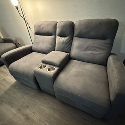 Ashley Furniture reclining couch set