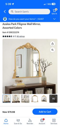Gold arched mirror