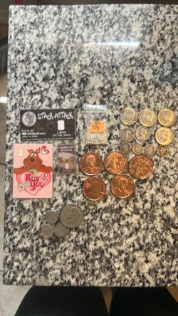 Silver, copper rounds and old American currency