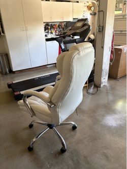 White leather-like rolling office chair