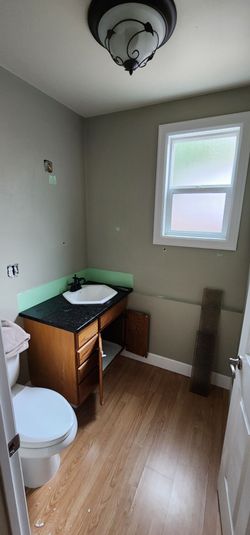 Bathroom vanity 38 3/4"x 23"with matching light up mirror  and matching towel  hangers and dome light