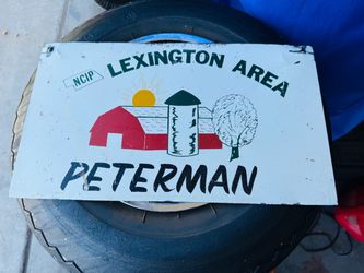 Vintage double sided Lexington Area Peterman sign