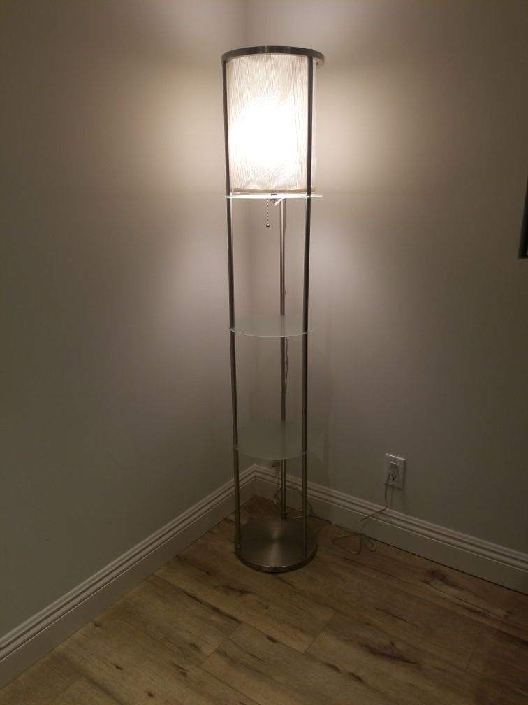 Lamp with glass shelves